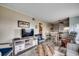 Inviting living area with a TV, comfortable seating, and an open layout at 1582 S Waccamaw Dr. # 34, Garden City Beach, SC 29576