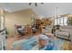 Open-concept living space with cozy seating, wood floors, and an inviting atmosphere at 1614 Cottage Cove Circle, North Myrtle Beach, SC 29582