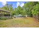Spacious backyard featuring a deck, above-ground pool, storage shed, and well-maintained lawn at 1894 Athens Dr., Conway, SC 29526