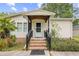 Front entrance of a single-Gathering home with brick steps and a covered porch at 1894 Athens Dr., Conway, SC 29526