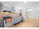 Functional kitchen featuring gray cabinetry and views to the dining and living spaces at 1894 Athens Dr., Conway, SC 29526
