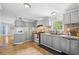 Efficient kitchen layout featuring ample cabinetry, modern appliances, and an adjacent dining area at 1894 Athens Dr., Conway, SC 29526