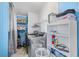 Functional laundry room featuring modern appliances, shelving, and storage space at 1894 Athens Dr., Conway, SC 29526