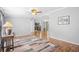 Spacious living room provides an open floor plan with hardwood floors and seamless flow into the kitchen at 1894 Athens Dr., Conway, SC 29526