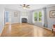 Bright living area features hardwood floors and a charming fireplace focal point at 1894 Athens Dr., Conway, SC 29526