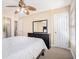 Bedroom featuring a ceiling fan, natural light from the window and a large dresser with mirror at 2101 Firebird Ln. # 14, Myrtle Beach, SC 29577