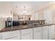 Efficient kitchen with a bar-style counter perfect for quick meals at 2101 Firebird Ln. # 14, Myrtle Beach, SC 29577