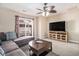 Cozy living room featuring a plush sectional sofa and sliding glass doors to a balcony at 2101 Firebird Ln. # 14, Myrtle Beach, SC 29577
