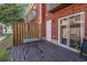 Private deck featuring wood fencing and sliding glass doors to the interior, ideal for relaxation at 2101 Firebird Ln. # 14, Myrtle Beach, SC 29577