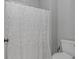 Bathroom featuring a toilet and a white shower curtain with a decorative pattern at 212 Greenwich Dr., Conway, SC 29526
