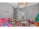 Bedroom with wood-look floors, a ceiling fan, and neutral-colored walls at 212 Greenwich Dr., Conway, SC 29526