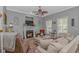 Comfortable living room with a cozy fireplace, TV and modern decor at 212 Greenwich Dr., Conway, SC 29526