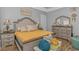 A main bedroom features a large bed with pillows, side tables and dressers at 212 Greenwich Dr., Conway, SC 29526