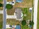 Aerial view of single story home on a spacious lot featuring a well-manicured lawn at 212 Sweetbay Magnolia St., Loris, SC 29569