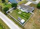 Large, fenced backyard offering a safe play area and additional outdoor storage at 212 Sweetbay Magnolia St., Loris, SC 29569