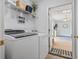 Functional laundry room equipped with modern washer and dryer, providing convenience and efficiency at 212 Sweetbay Magnolia St., Loris, SC 29569