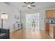 Spacious living room showcasing a seamless transition from the kitchen to the bright, open dining space at 212 Sweetbay Magnolia St., Loris, SC 29569