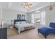 Inviting main bedroom suite with vaulted ceilings, comfortable seating, and ample natural light creating a relaxing retreat at 212 Sweetbay Magnolia St., Loris, SC 29569