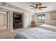 Bedroom showcases two beds, ceiling fan, and a window with backyard views at 2151 Bridge Ct. # 1-305, North Myrtle Beach, SC 29582