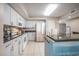 Bright kitchen with stainless steel appliances and ample counter space at 2151 Bridge Ct. # 1-305, North Myrtle Beach, SC 29582
