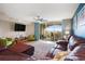 Comfortable living room featuring balcony access and cozy seating at 2151 Bridge Ct. # 1-305, North Myrtle Beach, SC 29582