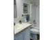 Cozy bathroom featuring tiled countertop, white cabinets and a shower and tub combination at 217 N Myrtle St. # 1, Myrtle Beach, SC 29577