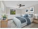 Cozy bedroom with carpeted floors, ceiling fan, and large window with views at 217 N Myrtle St. # 1, Myrtle Beach, SC 29577