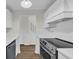 Well-lit kitchen showcases white cabinets, stainless steel oven, and sleek countertops at 217 N Myrtle St. # 1, Myrtle Beach, SC 29577