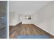Open-concept living room with hardwood floors and plenty of natural light at 217 N Myrtle St. # 1, Myrtle Beach, SC 29577