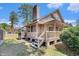 Exterior view with a brick chimney and porch at 2191 Liberty Circle, Little River, SC 29566