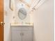 Functional bathroom featuring vanity with storage and ample lighting at 2191 Liberty Circle, Little River, SC 29566