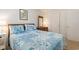 Inviting bedroom with neutral tones, a comfortable bed, and a side table at 2191 Liberty Circle, Little River, SC 29566