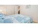 Bedroom featuring a blue comforter and access to a closet and other rooms at 2191 Liberty Circle, Little River, SC 29566