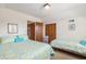 Spacious upstairs bedroom with twin beds and closet space at 2191 Liberty Circle, Little River, SC 29566