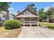 Charming home with front porch and a well-maintained yard at 2191 Liberty Circle, Little River, SC 29566