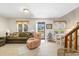 Cozy living room featuring lots of natural light, plush seating and stairway at 2191 Liberty Circle, Little River, SC 29566