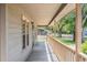 Exterior porch with railings and space for outdoor seating at 2191 Liberty Circle, Little River, SC 29566