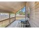 Cozy porch with seating area, perfect for relaxing outdoors at 2191 Liberty Circle, Little River, SC 29566