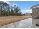 Expansive backyard with a newly poured patio and a detached two-car garage at 2260 Pearl Rd., Galivants Ferry, SC 29544