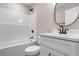 Well-lit bathroom featuring a vanity with black hardware, toilet, and shower at 2260 Pearl Rd., Galivants Ferry, SC 29544