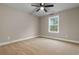 Bedroom with ceiling fan, carpet, neutral paint, and a window for natural light at 2260 Pearl Rd., Galivants Ferry, SC 29544