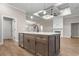 A lovely view of a kitchen island with stainless steel appliances and wood floors at 2260 Pearl Rd., Galivants Ferry, SC 29544