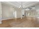 A spacious and bright living area with wood flooring, fireplace and coffered ceiling at 2260 Pearl Rd., Galivants Ferry, SC 29544