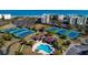 Aerial view showcasing the resort style community pool, tennis courts, and proximity to the beach at 24 Frigate Ct., Pawleys Island, SC 29585