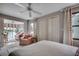 Cozy bedroom with a view to the sunroom, comfortable bed, and ample closet space at 24 Frigate Ct., Pawleys Island, SC 29585