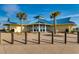 Charming clubhouse with a distinctive blue roof and ample windows, set amidst lush greenery and offering a tranquil retreat at 24 Frigate Ct., Pawleys Island, SC 29585