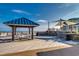 Relaxing outdoor deck area with comfortable seating, offering stunning views of the ocean and the community's beachfront amenities at 24 Frigate Ct., Pawleys Island, SC 29585