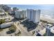 An aerial view of the condominium building with surrounding buildings and the beach at 2511 S Ocean Blvd. S # 1802B, Myrtle Beach, SC 29577