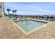 A luxurious outdoor pool area with lounge chairs and a splash pool, perfect for relaxation at 2511 S Ocean Blvd. S # 1802B, Myrtle Beach, SC 29577