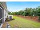 Green backyard with well-manicured lawn and mulched flowerbeds offering a serene outdoor space at 253 Bent Green Ct. # 70D, Murrells Inlet, SC 29576